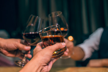 glass of wine in hand