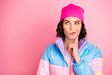 Closeup photo of amazing minded lady hand touch chin wear warm colored coat isolated pink background