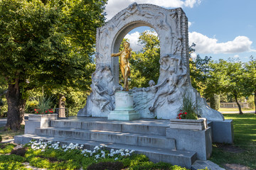 Vienna, Austria - September 4, 2019: Johann Strauss monument in September with nice cloudy sky in Stadtpark, Vienna, Austria