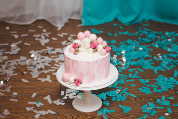 Pink First Year Birthday Cake with bear. Birthday cake with a bear and balls for the girl