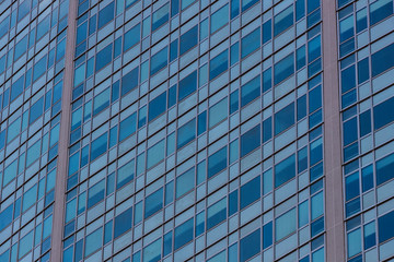 The background of the window of a multi-storey building is shot closeup.