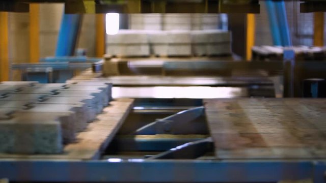 Production Line Inside A Road Pavement Factory. Interlocked Pavement Blocks
