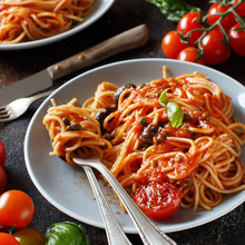 Spaghetti with tomato sauce olives and capers