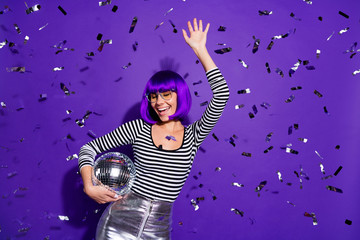 Portrait of carefree lady raising hand closing eyes wearing eyeglasses eyewear isolated over purple...