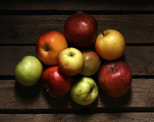 Apples on a wooden background