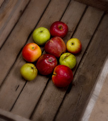 Apples on a wooden background