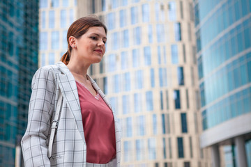 Young woman in checkered jacket