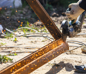 Sparks from cutting metal on the rack