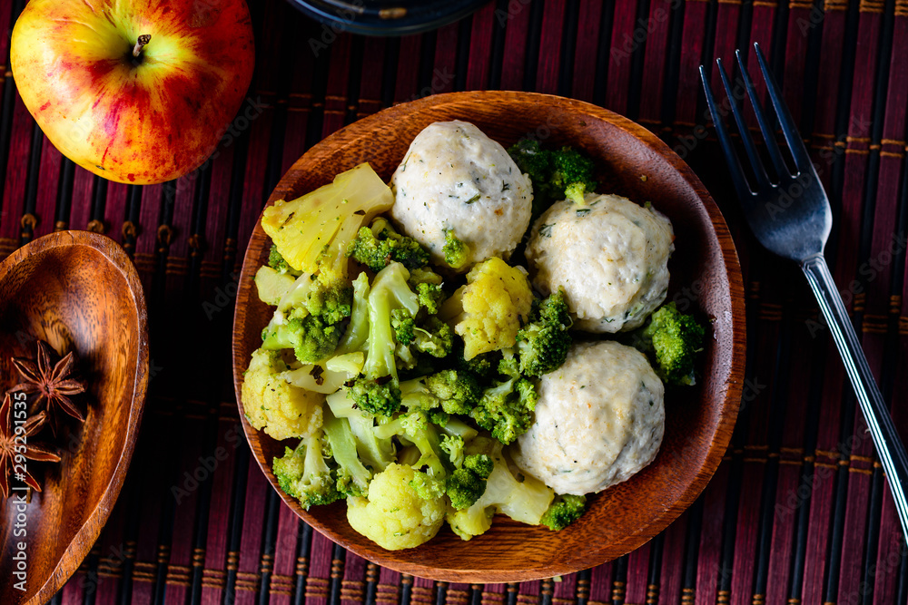 Wall mural steamed chicken meatballs and steamed vegetables, healthy nutrition