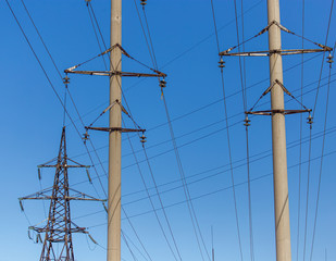 Electric pole against the blue sky