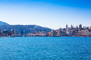 Obraz premium View from Lake Lucerne to Lucerne old town buildings, Switzerland