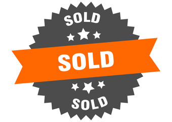 sold sign. sold orange-black circular band label