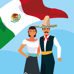 couple of people with typical Mexican costumes
