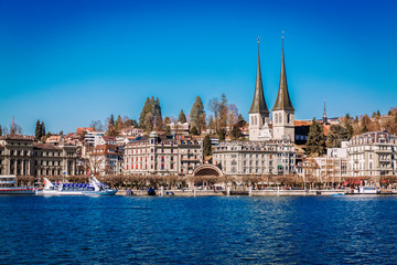 Fototapeta premium View from Lake Lucerne to Lucerne old town buildings, Switzerland