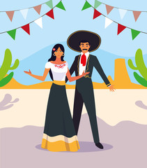 couple of people with mariachi costumes