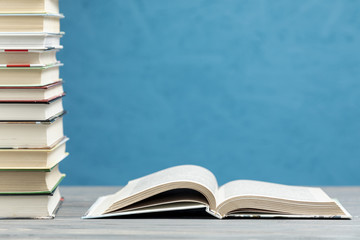 Front view pile of books with copy space