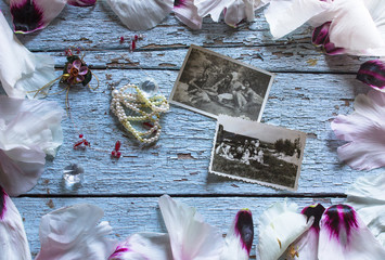 Wedding flower Peony petals on blue table from above. Flat lay style.