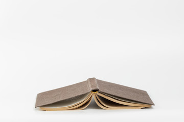 Front view upside down book with white background