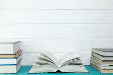 Front view piles of books with copy space
