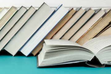Front view books on blue table
