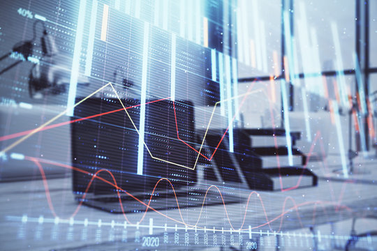 Forex graph hologram with desktop office computer background. Double exposure. Concept of financial analysis.
