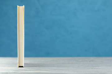 Front view book with blue background