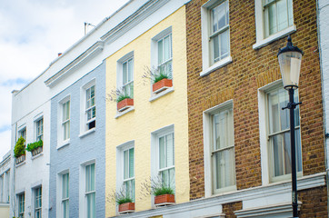 Fototapeta na wymiar Row of colourful terraced British houses