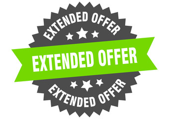 extended offer sign. extended offer green-black circular band label