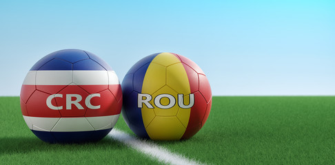 Romania vs. Costa Rica Soccer Match - Soccer balls in Chile and Costa Rica national colors on a soccer field. Copy space on the right side - 3D Rendering