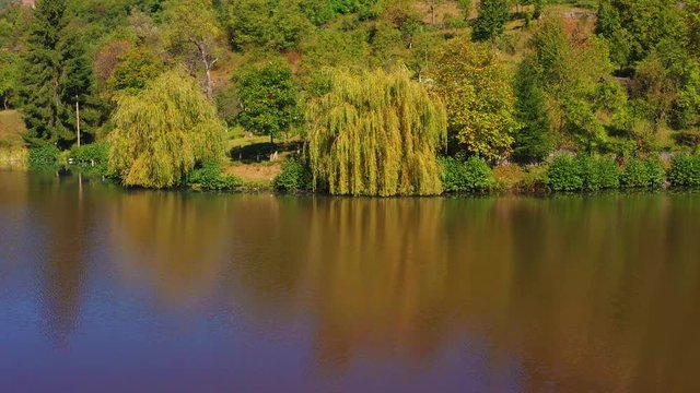 Aerial images of Lake Invartita, Nucsoara (is the largest karst lake formed on gypsum (calcium sulphate and soluble rock) From Romania.
