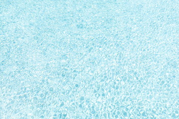Fototapeta na wymiar swimming pool surface , abstract texture on water by windy . close up top view background of summer holiday at resort and spa .
