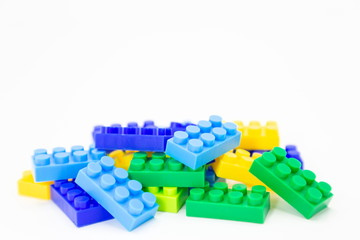 brick blocks toy mini figures colorful on white background . building plastic fun collection for child .