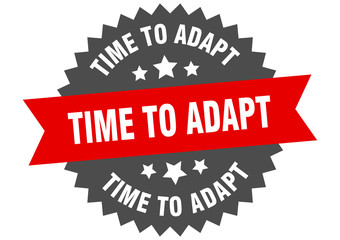 Fototapeta premium time to adapt sign. time to adapt red-black circular band label