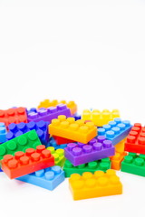 brick blocks cube colorful on white background . building plastic fun collection for child with copy space . vertical picture .