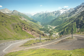 Fototapeta na wymiar view of the main Caucasian ridge from the slopes of the highest peak in Europe, Mount Elbrus
