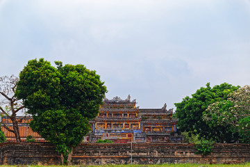 View from backyard on the colorful building in Purple Forbidden city (Imperial Citadel) in Hue,...