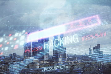 Double exposure of hacking theme drawing hologram on cityscape background. Concept of data cyber piracy