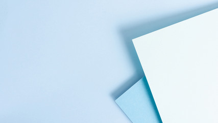 Blue toned pack of paper sheets with copy space