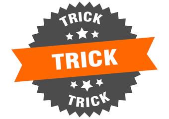 trick sign. trick orange-black circular band label