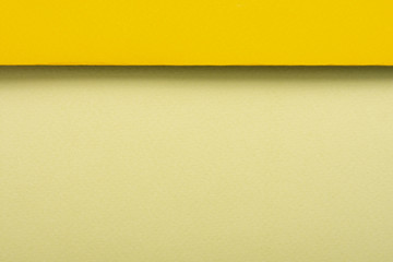Yellow toned paper sheets with copy space