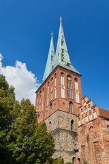 Obraz premium bell towers of the historic church, Gothic St. Nicholas Church in Berlin.