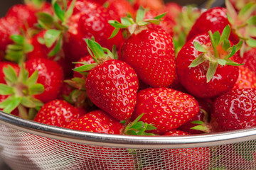Close up of fresh ripe strawberry fruits