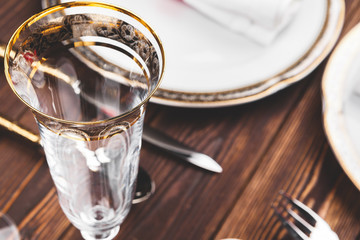 Brown wooden table with beautiful Christmas table setting