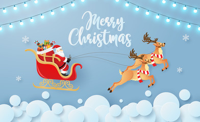 Origami paper art of Santa Claus and reindeer flying on the sky, Merry Christmas and Happy New Year