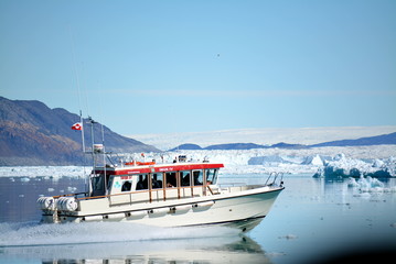 Disko Bay, Greenland - July - boat trip in the morning over the arctic sea - Baffin Bay - calving glacier eqi, world heritage, ice breaking of