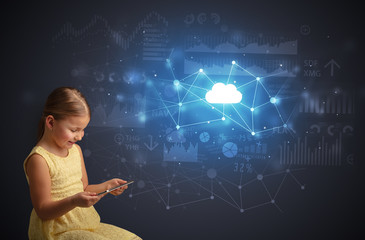 Adorable girl working on tablet with cloud technology concept