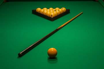 balls and cue on a pool table