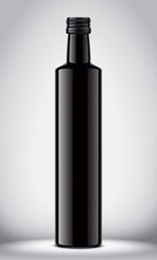 Glass black bottle on gray background