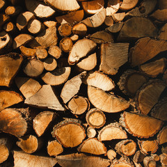 Wall firewood , Background of dry chopped firewood logs in a pile. Harvesting firewood for the winter. Harvesting firewood for the winter.