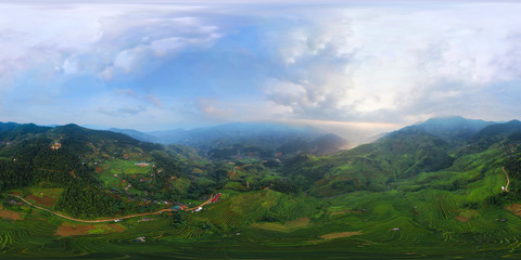 360 panorama by 180 degrees angle seamless panorama view of paddy rice terraces, green agricultural...